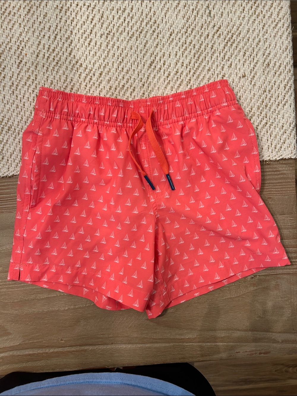 Southern Tide Coral Pink Boys' Swim Trunks with Tiny White Sailboats